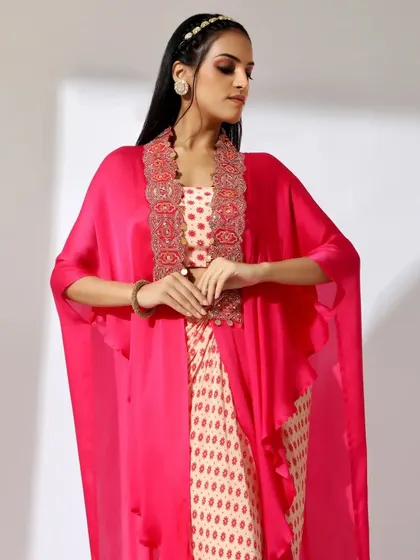 Another look from the same fashion campaign, this time with a bold pink cape. The makeup was kept clean and fresh to let the outfit shine.