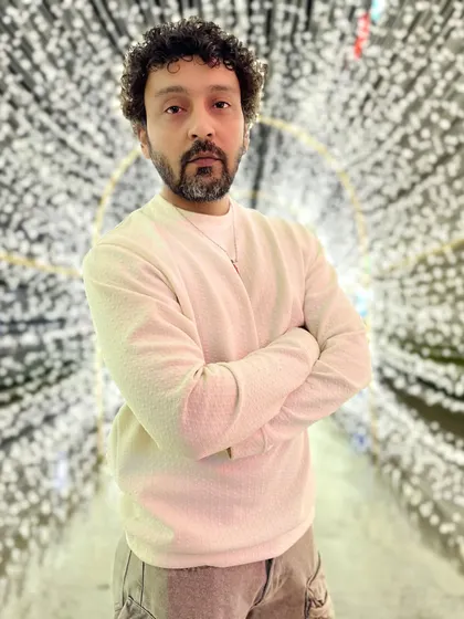A self-portrait in a tunnel of lights. I love playing with creative lighting, even for my own photos.