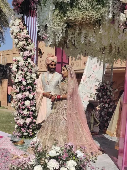 A picture perfect moment under a breathtaking floral mandap. For this destination wedding in Rajasthan, we blended classic elegance with soft, romantic details to create an unforgettable ceremony.