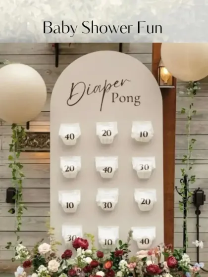 We love adding playful and unique touches to baby showers. This "Diaper Pong" game was a fun and interactive way for guests to celebrate the parents-to-be, bringing lots of laughter to the floral-themed event.