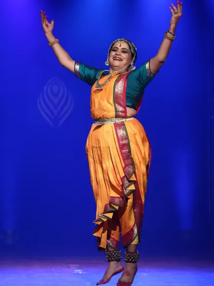 A moment of pure joy and abandon on stage. The energy of a live performance, with the orchestra and the audience, is truly electrifying.