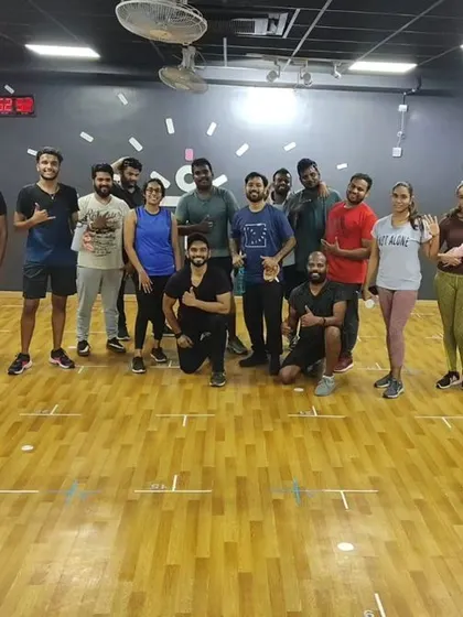 The heart and soul of my classes. Each photo captures a unique moment with my incredible community after a sweaty, joyful session. This is our shared victory lap.