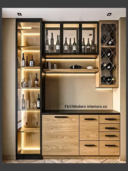 This modern bar unit features a tall glass cabinet with lighting, a built-in wine rack, and plenty of drawers and shelves. The combination of natural wood and black metal accents is very chic.