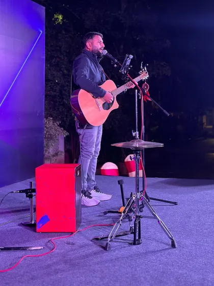 A side view of my performance at a corporate gig. The simple stage setup is ideal for professional events where music adds to the ambiance.