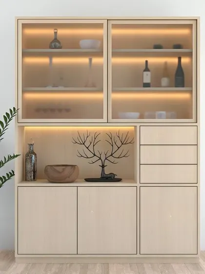 This light and airy crockery unit uses a pale wood finish and frosted glass doors. The internal lighting gives it a soft, beautiful glow, perfect for a minimalist or Scandinavian-style home.