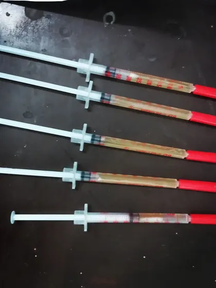 More syringes of Platelet Rich Plasma, showcasing the 'liquid gold' used in regenerative treatments for skin and hair.