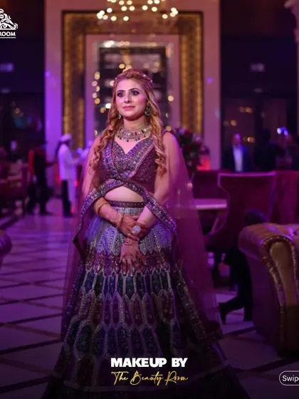 This client looks like she's ready for the red carpet. The makeup is flawless and designed to look amazing under the vibrant lights of an event venue.