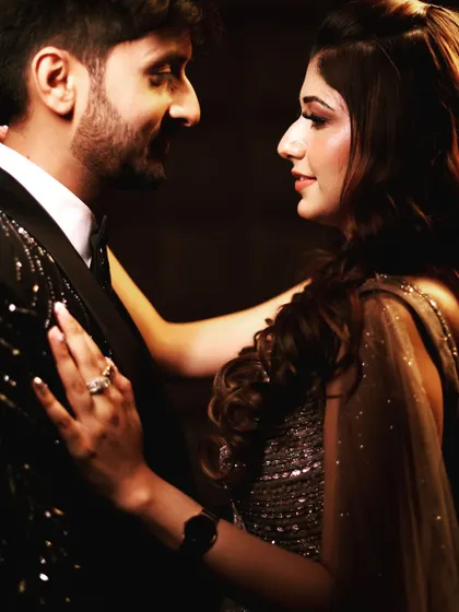 A romantic close-up portrait of a couple from their engagement or reception.