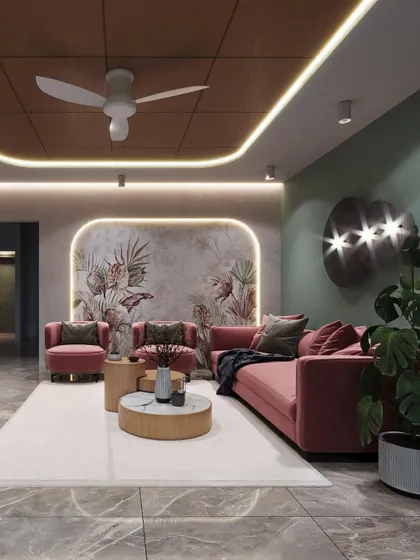 A vibrant living room design for a Bangalore project, featuring blush pink sofas and armchairs. A custom wallpaper with a tropical motif serves as a stunning backdrop, complemented by modern cove lighting.