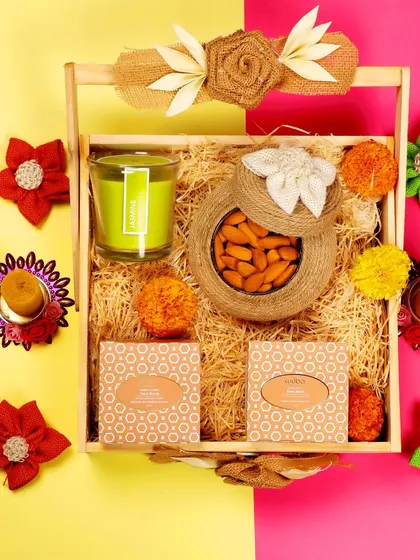 A styled flat-lay of a face scrub and mask set, using bright colors and decorative flowers to attract attention.