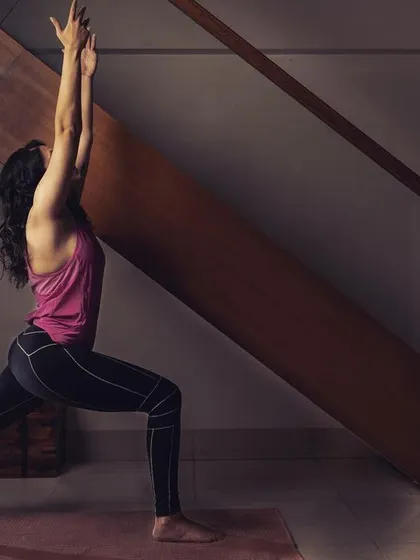 A class described as 'Hatha' yoga will typically involve a set of physical postures and breathing techniques practiced more slowly than a vinyasa class. The practice aims to balance the sun ('ha') and moon ('tha') energies in the body.