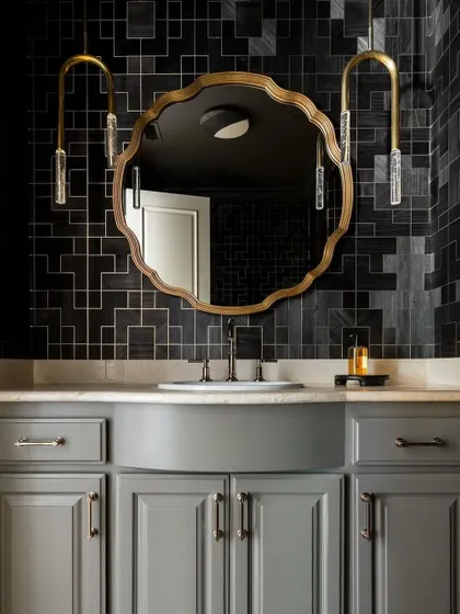 This atmospheric powder room showcases the 'Fretwork' collection from Phillip Jeffries in a bold charcoal shade. The elaborate geometric pattern adds depth and sophistication, turning a small space into a dramatic design moment.