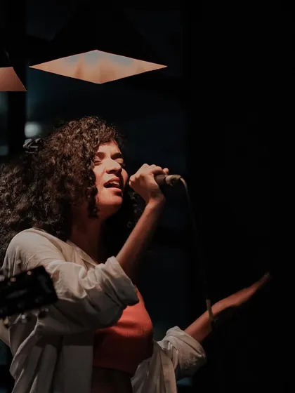 Singing with my whole heart during an intimate gig. These are the moments where the music feels most personal and raw.