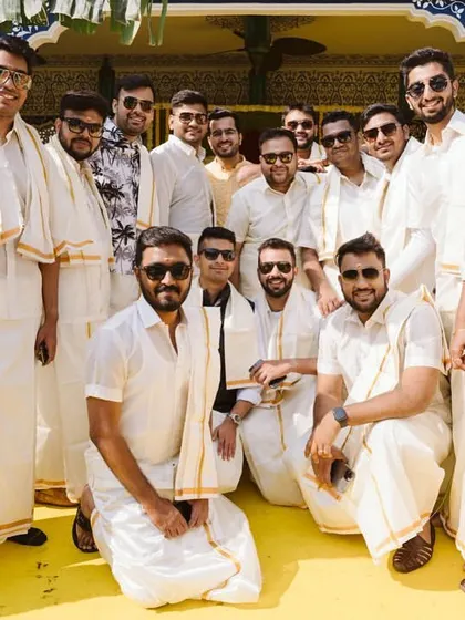 The groom's squad, dressed in traditional South Indian attire for the Haldi ceremony. Themed dress codes can add another layer of fun to the events.