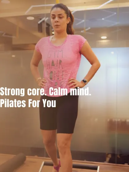 A strong core and a calm mind are the goals. This client stands with confident posture, a direct result of the full-body toning and alignment work we do in every class.