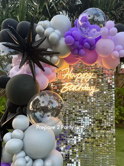 Celebrating 40 is a big deal. My designs for this milestone often include glamorous elements like sequin walls and neon signs, with customizable color palettes to suit any taste.