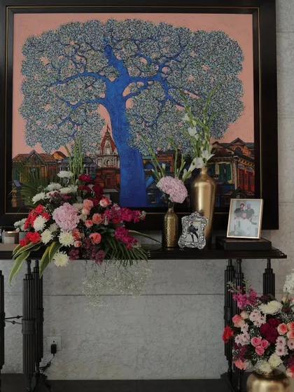 We often create memory tables that feature the couple's photos alongside beautiful floral arrangements, making the decor personal and heartfelt.
