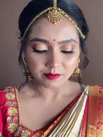 A closer look at the eye makeup for a Muhurtham ceremony. I used a beautiful gold shimmer on the lids to catch the light, defined with a sharp wing liner to make her eyes the focus.