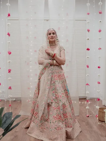 A special project where I recreated Anushka Sharma's iconic wedding and reception looks. From the floral bun to the sleek reception updo, it was amazing to bring these celebrated styles to life.