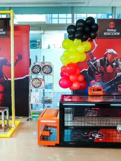 Action-packed game zone. A Deadpool-themed party isn't complete without challenges like mini soccer and a hanging challenge, ensuring guests are entertained for hours.