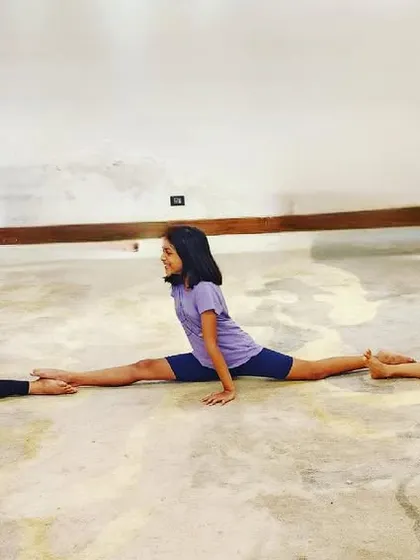 Look at this amazing display of teamwork and flexibility. Our students are practicing their middle splits together, motivating each other to reach their goals in a fun and supportive group setting.