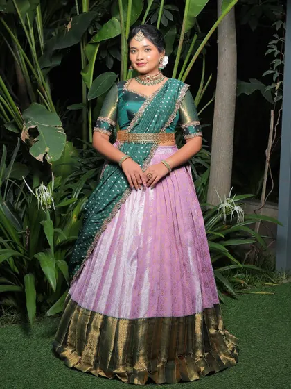 Full-length view of the green and pink langa voni, a timeless and elegant choice.