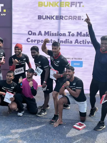 Celebrating with the team after a successful challenge. The energy and camaraderie at these OCR events are incredible.