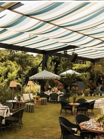 I believe every celebration should feel effortless and chic. For this 30th birthday garden soiree, I used striped fabric canopies, lush greenery, and comfortable lounge seating to create a relaxed yet sophisticated atmosphere for an outdoor luncheon.