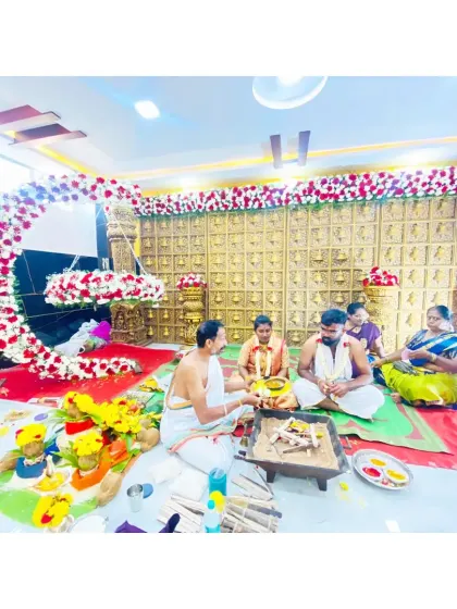 Here you can see one of my naming ceremony decorations in action during the pooja. The floral crescent moon cradle provides a beautiful centerpiece for the family as they perform the traditional rituals.