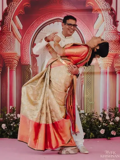 Amidst the grandeur of the Rajput palace-themed stage, the couple shares a playful dance. These are the candid, joyful moments that make a wedding celebration truly special.