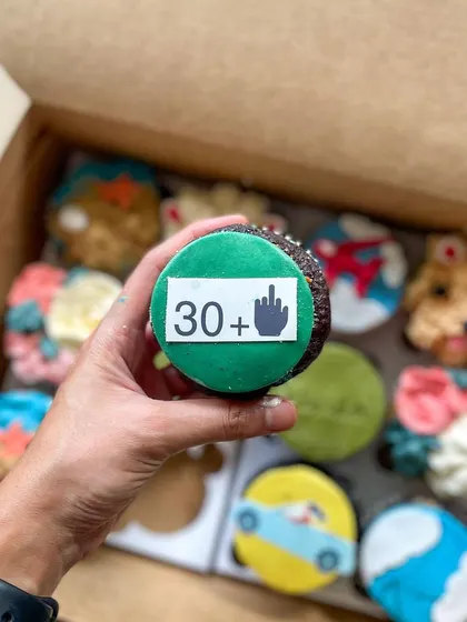 A fun "30+" cupcake for a milestone birthday celebration.