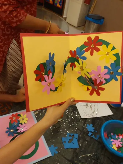 A close-up of a beautiful, handmade pop-up floral card for Mother's Day. These heartfelt creations are the best gifts.