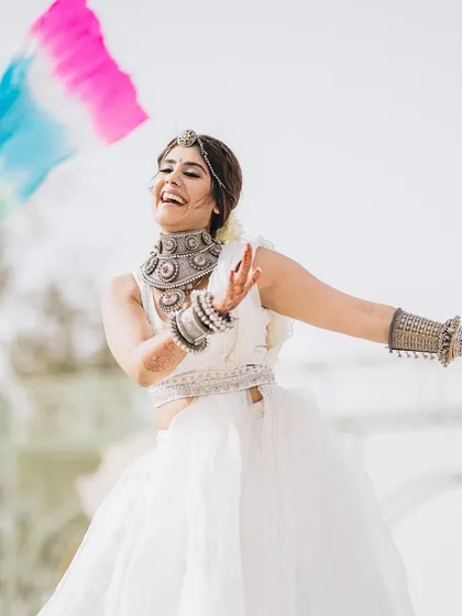The pure, unadulterated joy of dancing. This bride's radiant smile says it all.