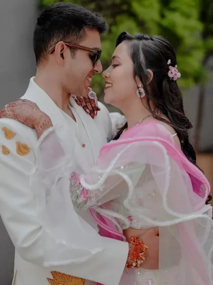 The happy couple sharing a smile. Her natural-looking makeup and hairstyle were perfect for these candid, joy-filled photographs.