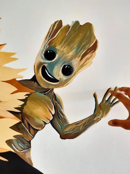 "I am Groot." A close up of our interactive Groot painting, where you can give him a high five.