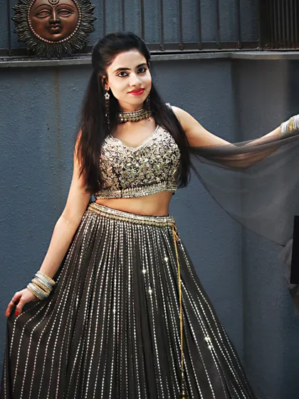 A full-length shot of the black and silver lehenga, perfect for a cocktail party or reception.