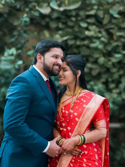 A sweet embrace between a couple in their reception attire.
