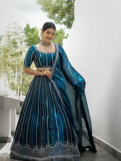 Another angle of this modern and chic look. The makeup is fresh and luminous, perfect for any celebration.