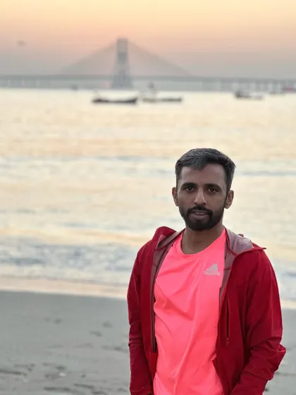 A moment of reflection at the beach. Running gives us the opportunity to explore beautiful places and find peace.
