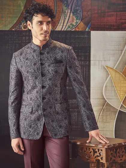 Where heritage meets contemporary elegance. This grey bandhgala features a subtle paisley pattern, crafted to perfection for a refined and distinguished look.