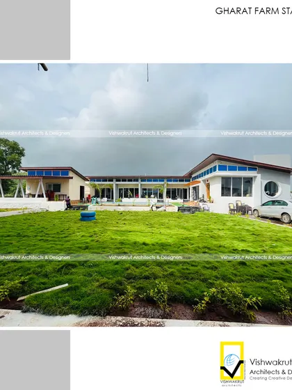 The Gharat Farm Stay in Pali, where my goal was to build in harmony with nature. This wide view shows how the structure integrates with the lush landscape, featuring expansive lawns and open architecture that respects the natural contours of the land.