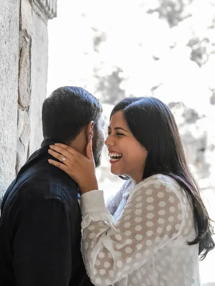 A moment of shared laughter and joy. We believe in capturing these unposed, genuine emotions that truly define your relationship.
