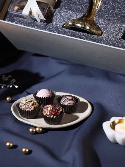 Our assorted chocolate truffles, a perfect small indulgence to add to any festive hamper.