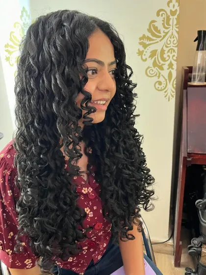 A side view showing the healthy, defined ringlets.