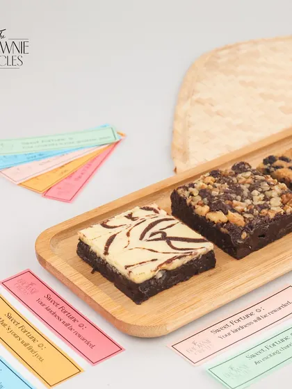 We believe in adding a personal touch. Our gift boxes can include these small "Sweet Fortune" notes to add a bit of fun and a positive message to your gift.