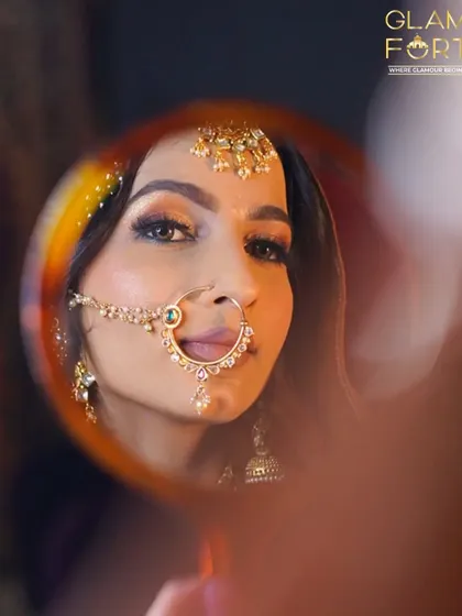 A creative shot using a mirror to capture the intensity of the eyes. This is a look that tells a story, perfect for a themed wedding event or a special photoshoot.