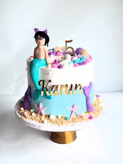 Why should mermaids have all the fun? Here's a Merman cake for Karun's 5th birthday, part of a larger underwater ocean theme.