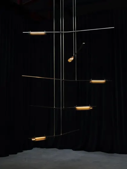 A large, multi-tiered Volant installation, showcasing its potential as a grand, kinetic-style sculpture for spaces with high ceilings.