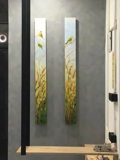 This office pillar was updated with a smooth, cloudy grey texture. It provides a neutral yet interesting background that enhances the professional atmosphere of the workspace.