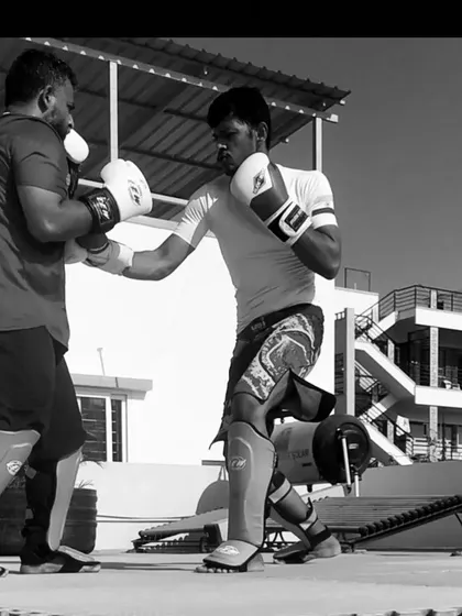 A duplicate of image 78, showing an outdoor sparring session.